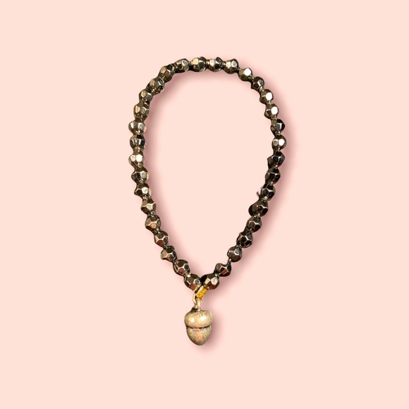 Black bracelet with metal piece hanging - Picture 1 of 5